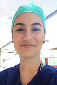 Female doctor in uniform smiling