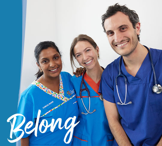Nurse and two doctors smiling with wording 'Belong.'
