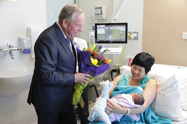 Premier Colin Barnett meeting the first baby to be born at FSH