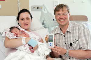Lisa Bailey and her daughter Isla-Marie Ranui as Dr Jean Du Plessis demonstrate the use of the pulse oximeter to monitor the baby’s oxygen levels