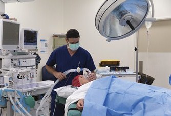 Photo of anaesthetist and patient