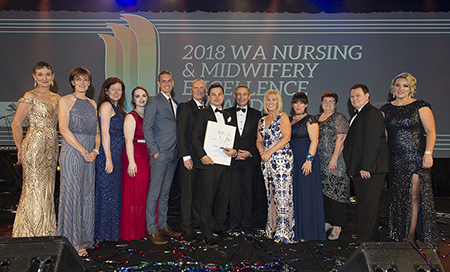 Winners of the WA Nursing and Midwifery Excellence Awards onstage at the 2018 gala dinner